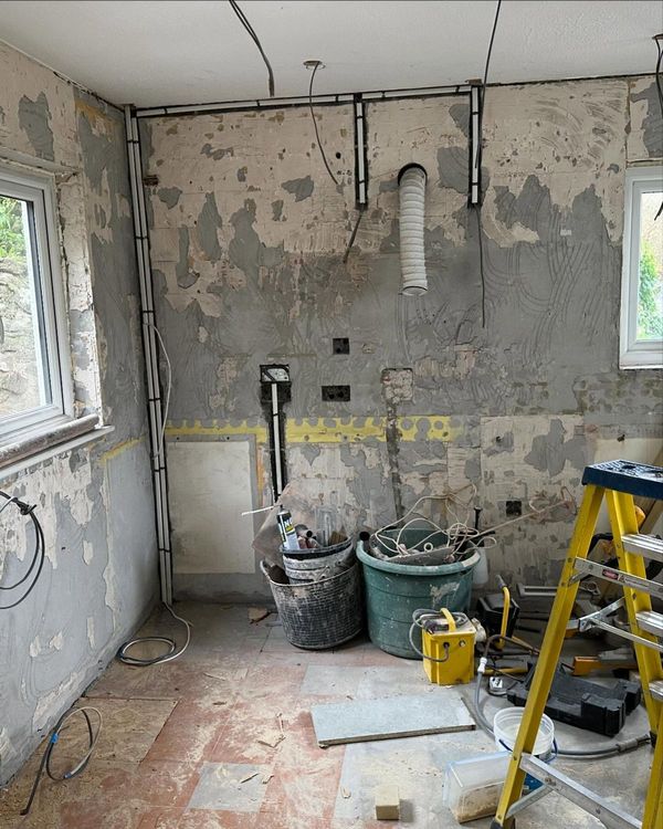 Kitchen stripped back with new cables run before plastering