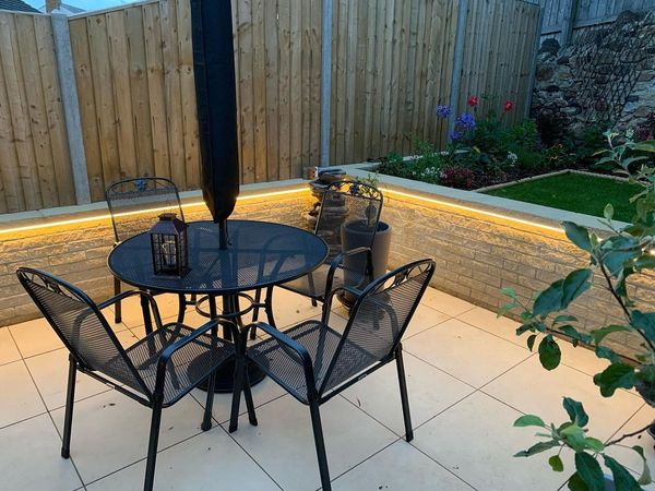 Patio with LED lighting along the raised beds